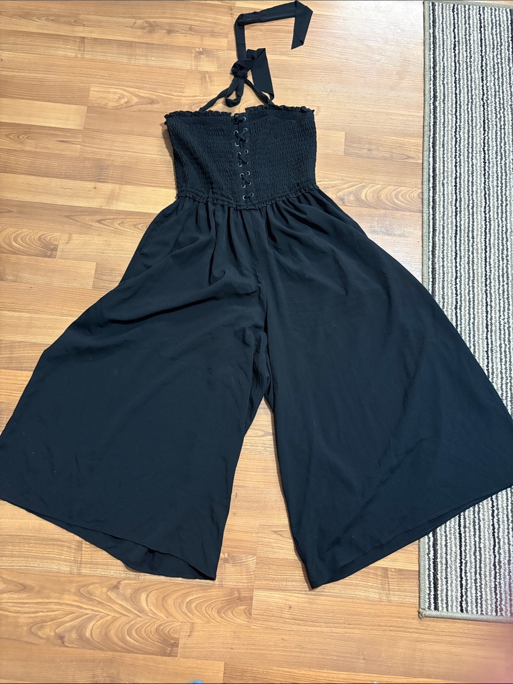 torrid Black Smocked Halter Jumpsuit with Lace-Up Front